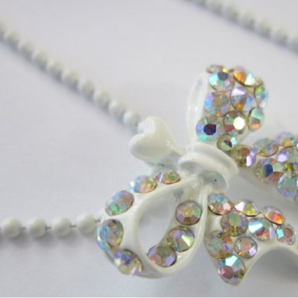 White Enameled Necklace with Bow Pendant & Iridescent AB Crystals.